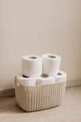 white tissue rolls on basket